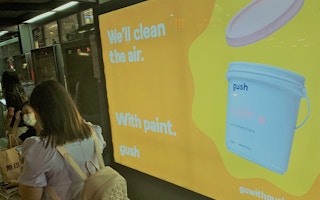 A billboard promoting Gush paint in Singapore.