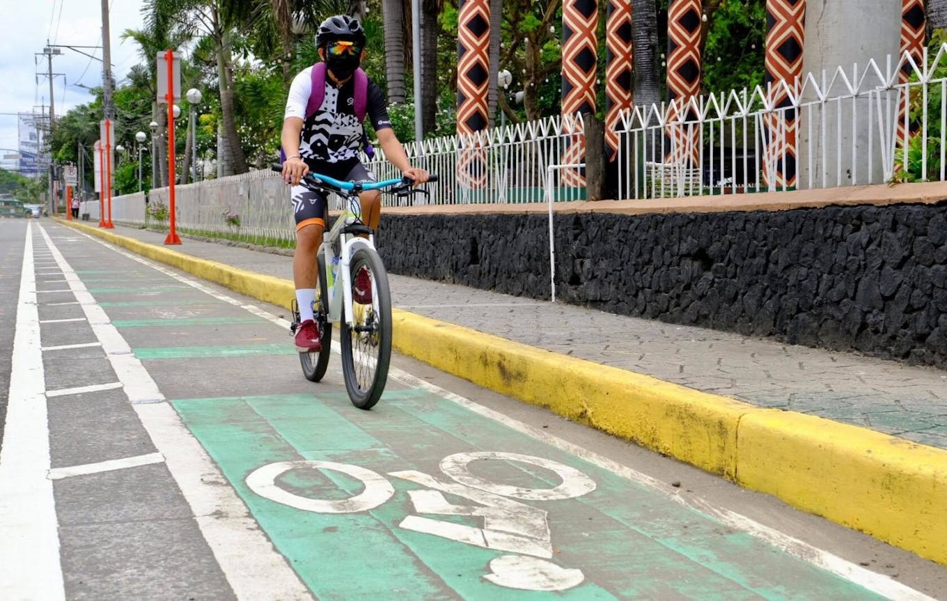 A cyclist passes through the newly-built 54.71 kilometer bike Lane in Davao City in Mindanao.