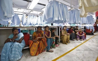 Indian garment workers during lunch time break