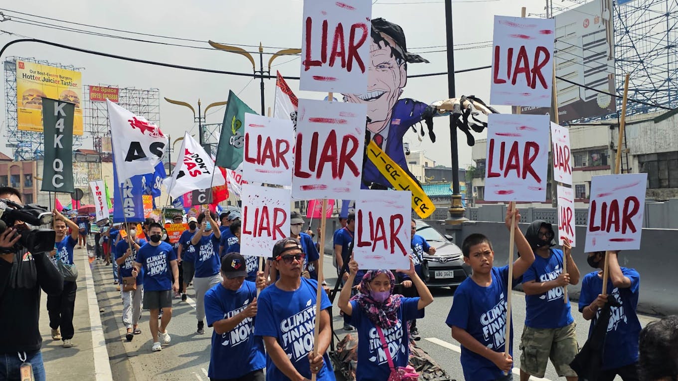Climate campaigners hold a protest action near the US embassy in Manila