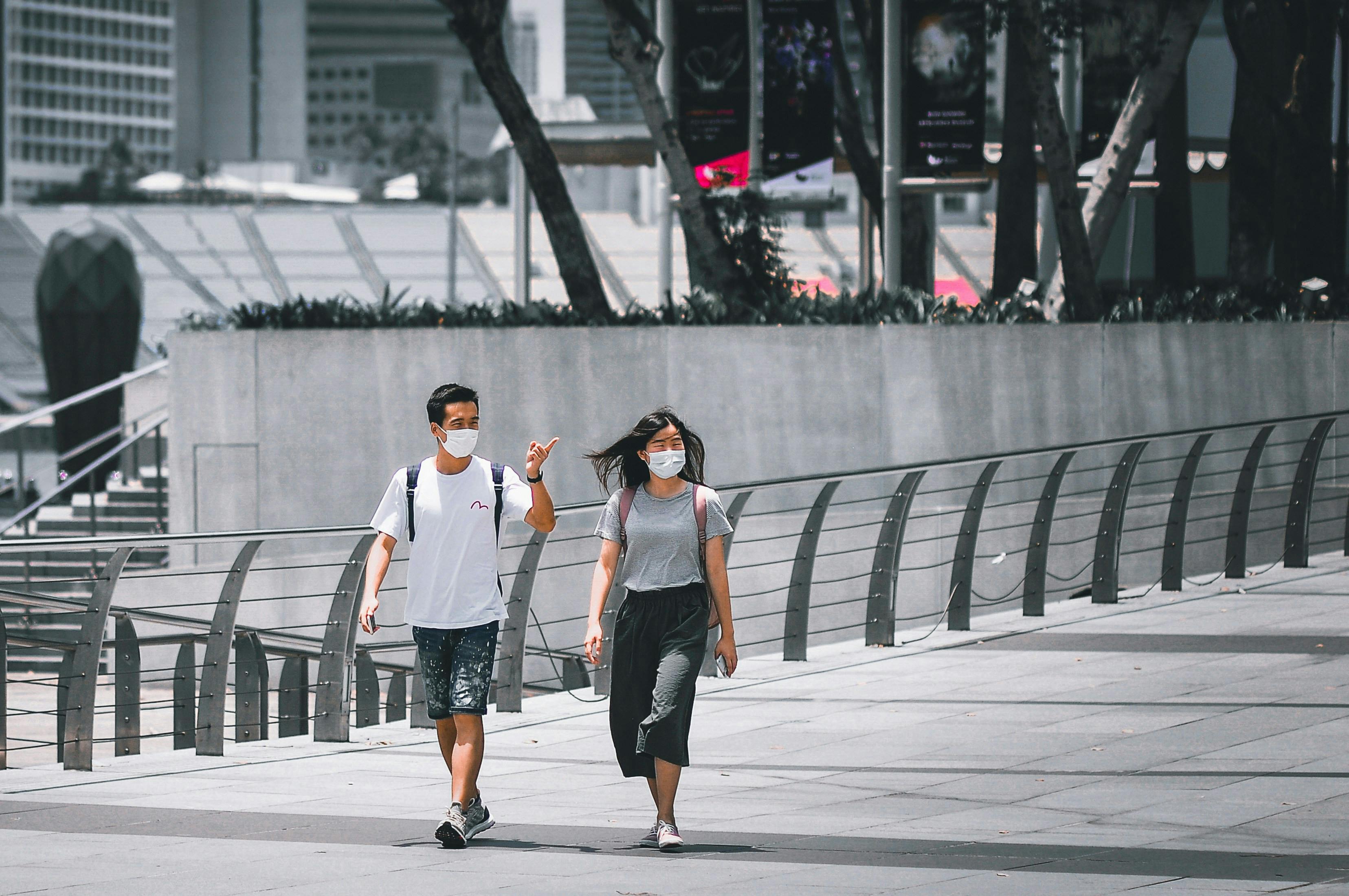 Tourists wearing masks in Singapore during COVID 19 pandemic