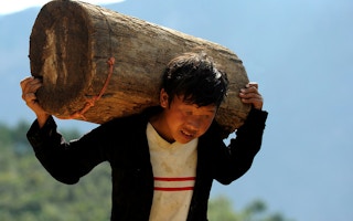 boy with heavy load