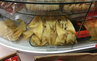 Shark fin for sale at Chang Bai Shan Ginseng Medical Hall in Chinatown, Singapore. Singapore is the world's second largest trader in the controversial dish, a fact that the Straits Times attempted to bury. Image: Eco-Business