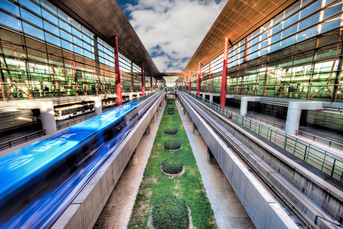 Monorail shuttles whisk passengers through the Beijing Airport.