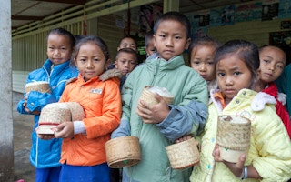 Children in Laos get free school lunches in government and World Bank programme