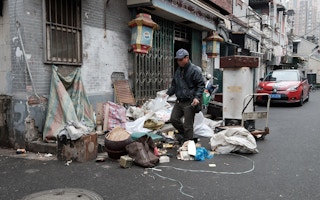 Rubbish picker collects trash in China