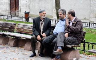 Men in conversation in Istanbul. 
