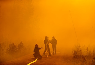 Polish firefighers battle the blaze in Karbole, Sweden