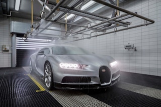 A sports car getting a wash at the factory