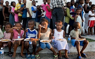 Children receive meals in Haiti