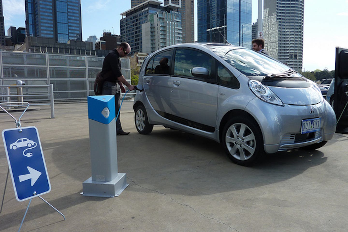 Man charges EV