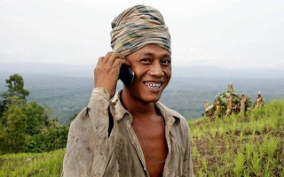 happy farmer on the cellphone