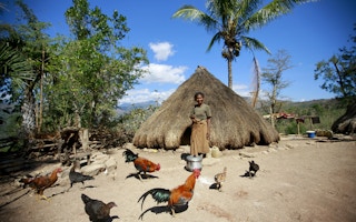 woman home east timor