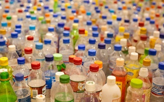 a sea of plastic bottles lined up