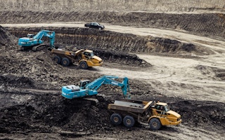 Coal is transported from mining sites by trucks in Indonesia. 