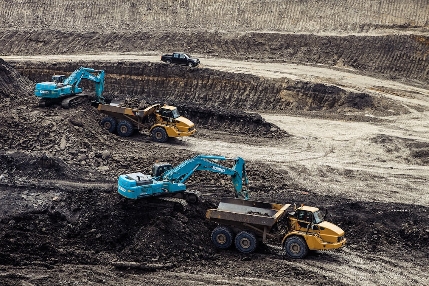 Coal is transported from mining sites by trucks in Indonesia.