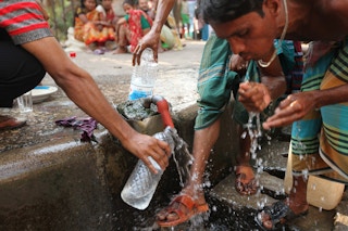 people drinking dirty water