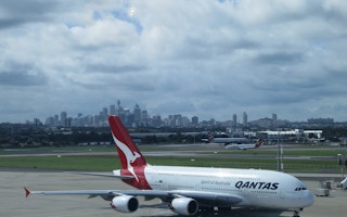 A Qantas plane on the runway at Sydney's aiport