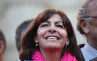 Anne Hidalgo smiles
