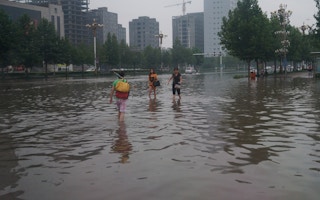 china floodwaters wading