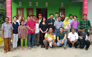 Aida with community members in Riau