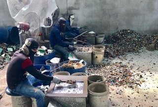 Electronic waste being processed in an informal setting in Thailand. Image: Basel Action Network