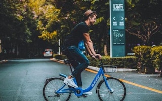 Man on bluegogo bike