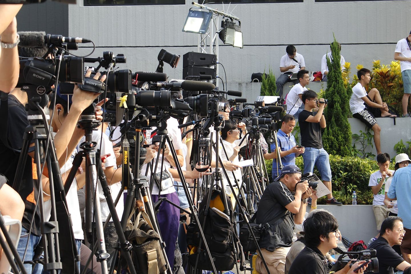 Hong Kong media waiting for a story