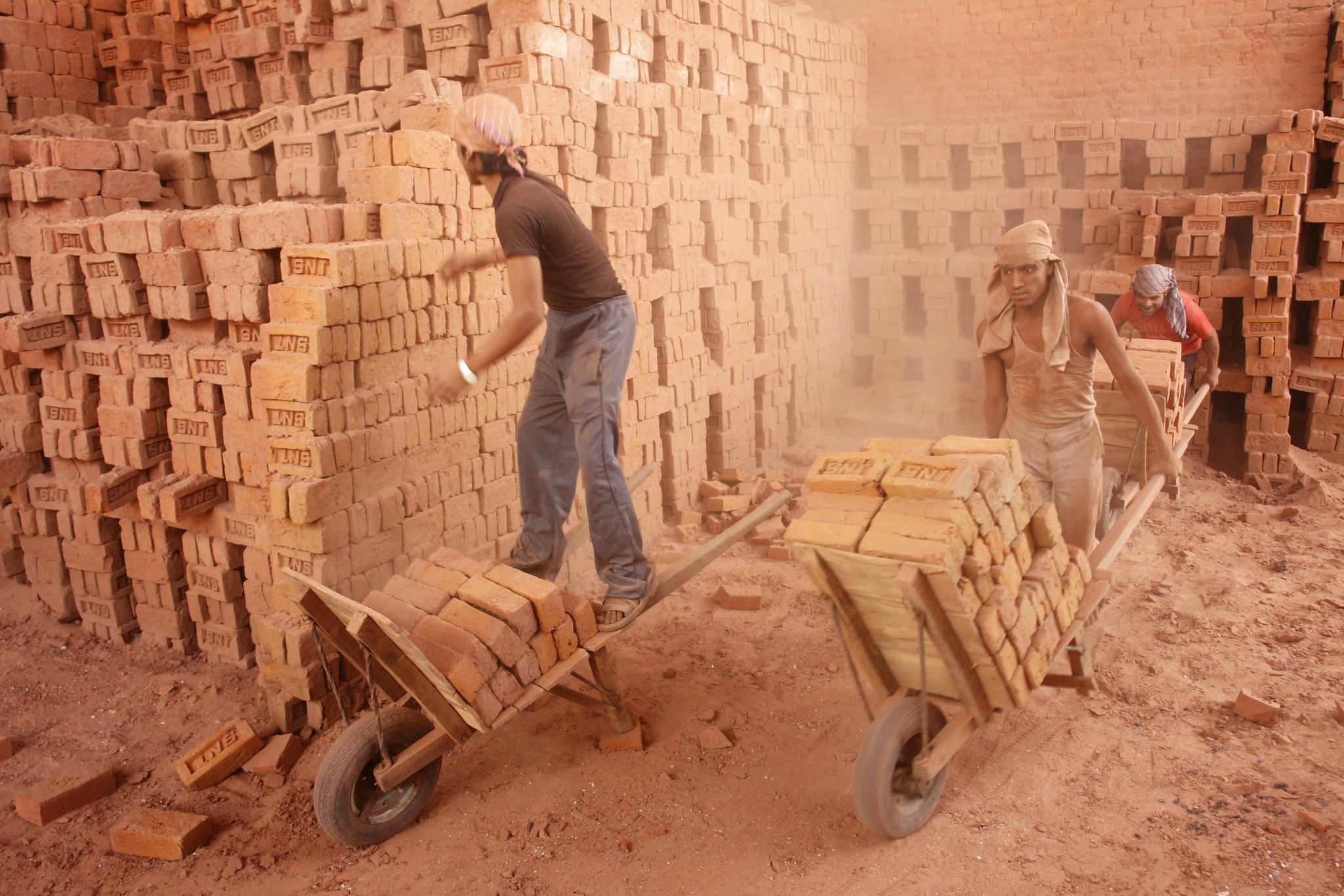 Labourers in brick kiln, India.