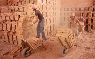 Labourers in brick kiln, India.