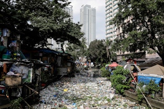 Estero de Magdalena, a marine channel running through the city of Manila. Typhoon Ompong has revealed the scale of plastic pollution in the Philippine capital. Image: Joshua Paul/Greenpeace