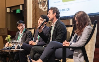 Brian Reilly, founder and chief executive of Revolv, talks on a panel at Unlocking Capital for Sustainability. Reilly raised US$500,000 from Hong Kong-based hedge fund Sylebra and is looking to secure more funding to aid the company’s launch in Singapore. Image: Eco-Business