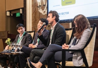 Brian Reilly, founder and chief executive of Revolv, talks on a panel at Unlocking Capital for Sustainability. Reilly raised US$500,000 from Hong Kong-based hedge fund Sylebra and is looking to secure more funding to aid the company’s launch in Singapore. Image: Eco-Business