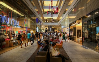 A shopping mall in Singapore. More than half of Singapore consumers believe businesses have a responsibility to ensure their supply chains are free from environmental harm or negative social practices. Image: <a href="https://www.flickr.com/photos/levoodoo/4391795562/">Lip Jin Lee</a>, <a href="https://creativecommons.org/licenses/by-nc/2.0/">CC BY-NC 2.0</a>
