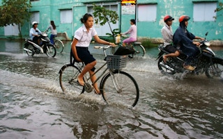 vietnam floods bicycle