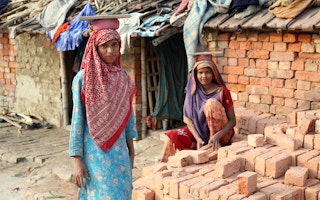 Women brick-kiln workers in India demand better work conditions