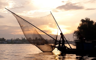 Fishing in Mekong River in Vietnam